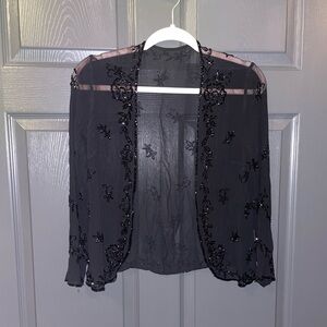 Sheer long sleeve top with embellishments